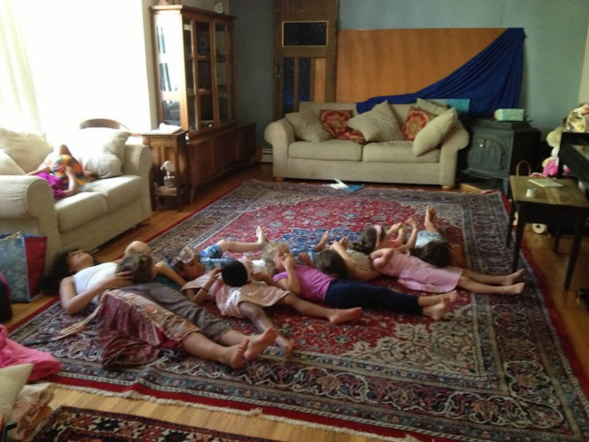 A group of children practice yoga at co-op camp in Chestnut Ridge, New York, in 2012.
