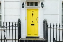 A house with a yellow door.