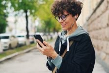 Person using the anti-budget method to manage finances with minimal tracking