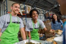 People volunteer at a food pantry.