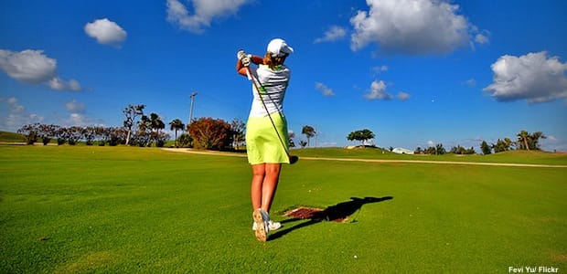 Woman playing golf