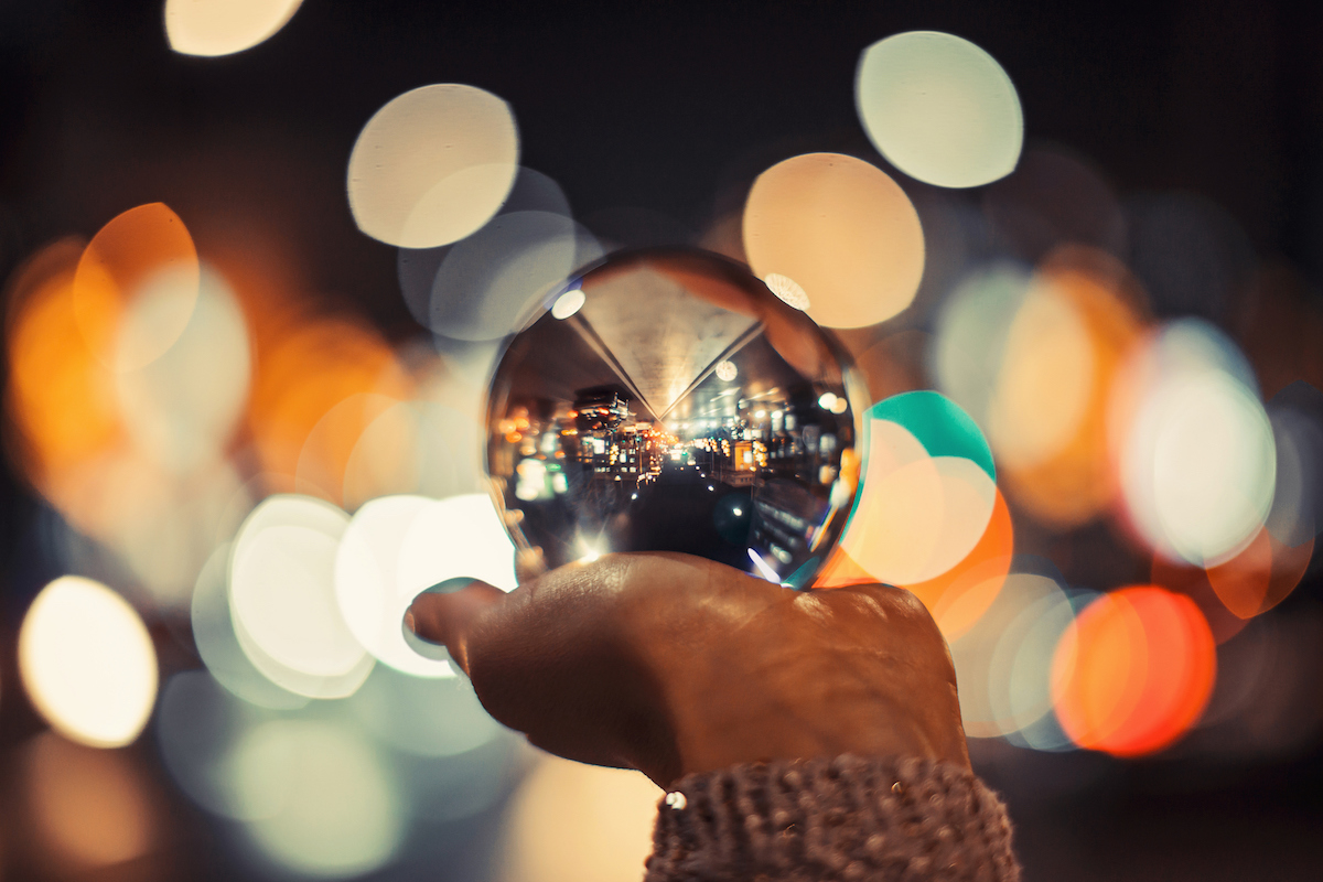 hand holding crystal ball