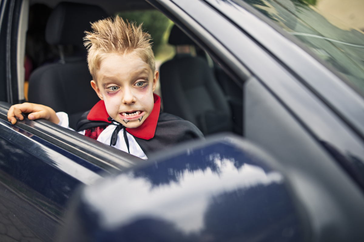 little boy dressed up as a vampire