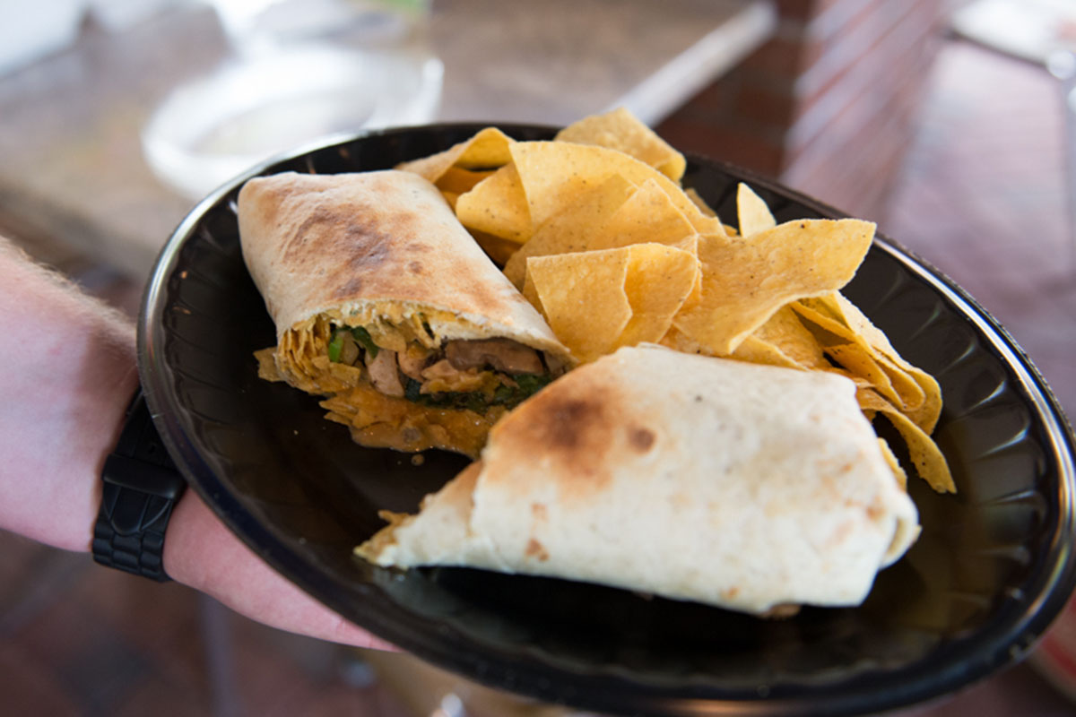 Tijuana Flats burrito and chips on plate