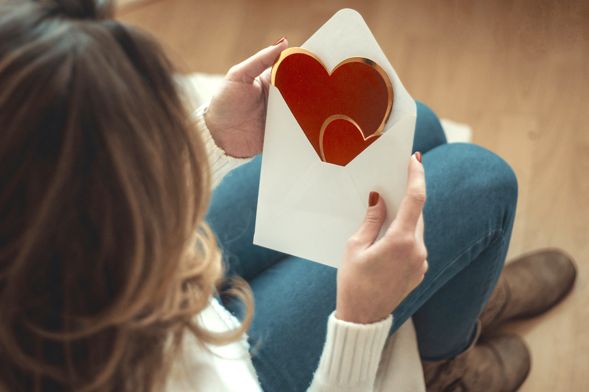 young woman with valentines card