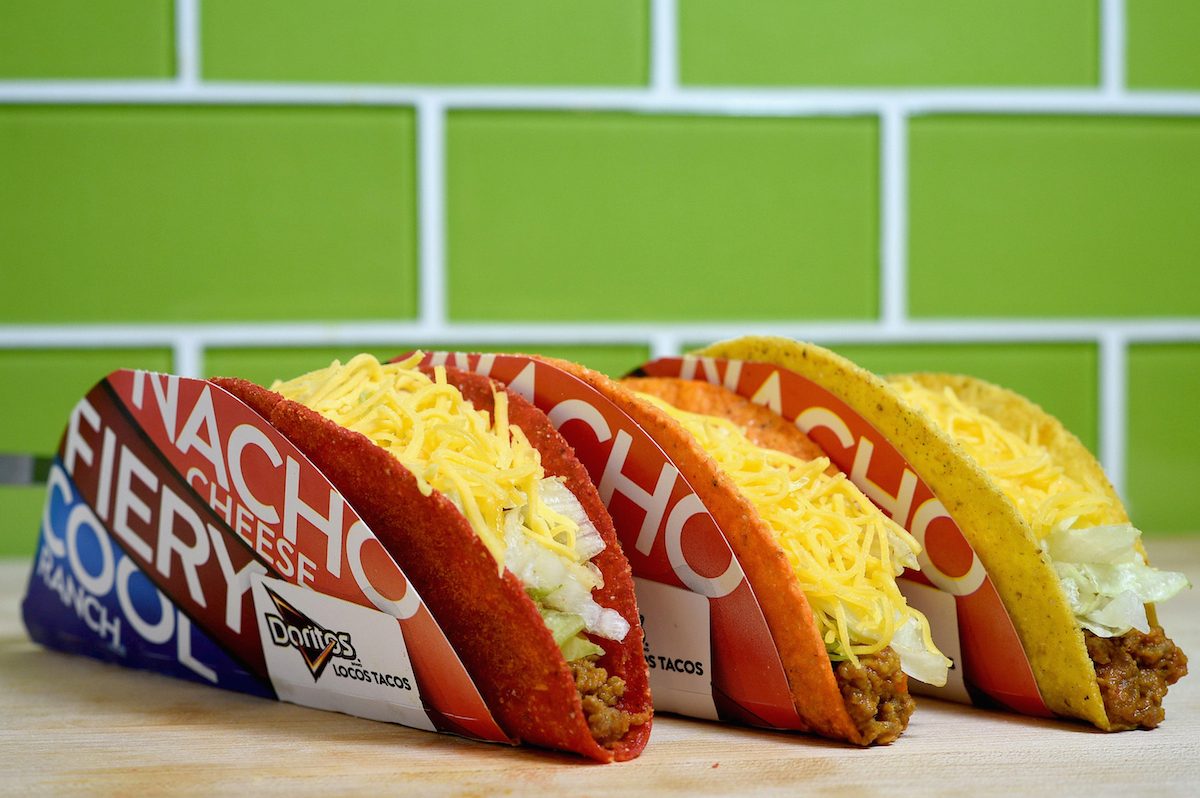 Doritos Locos tacos against a green tile back drop.