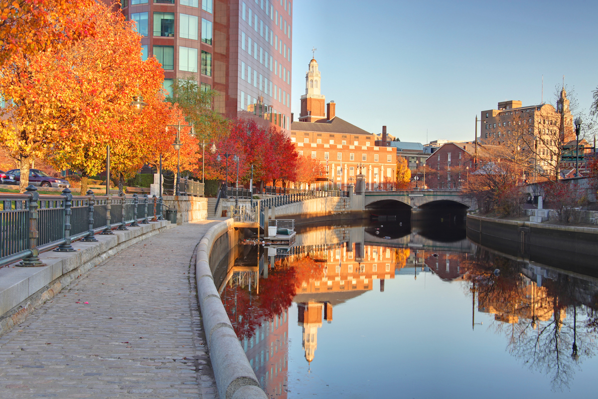Buildings relfecting on a canal from Waterfront Park in Providence,Rhode Island