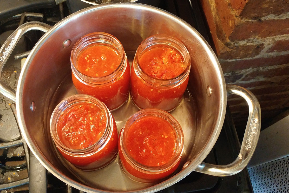 Tomatoes are prepared to before being canned.