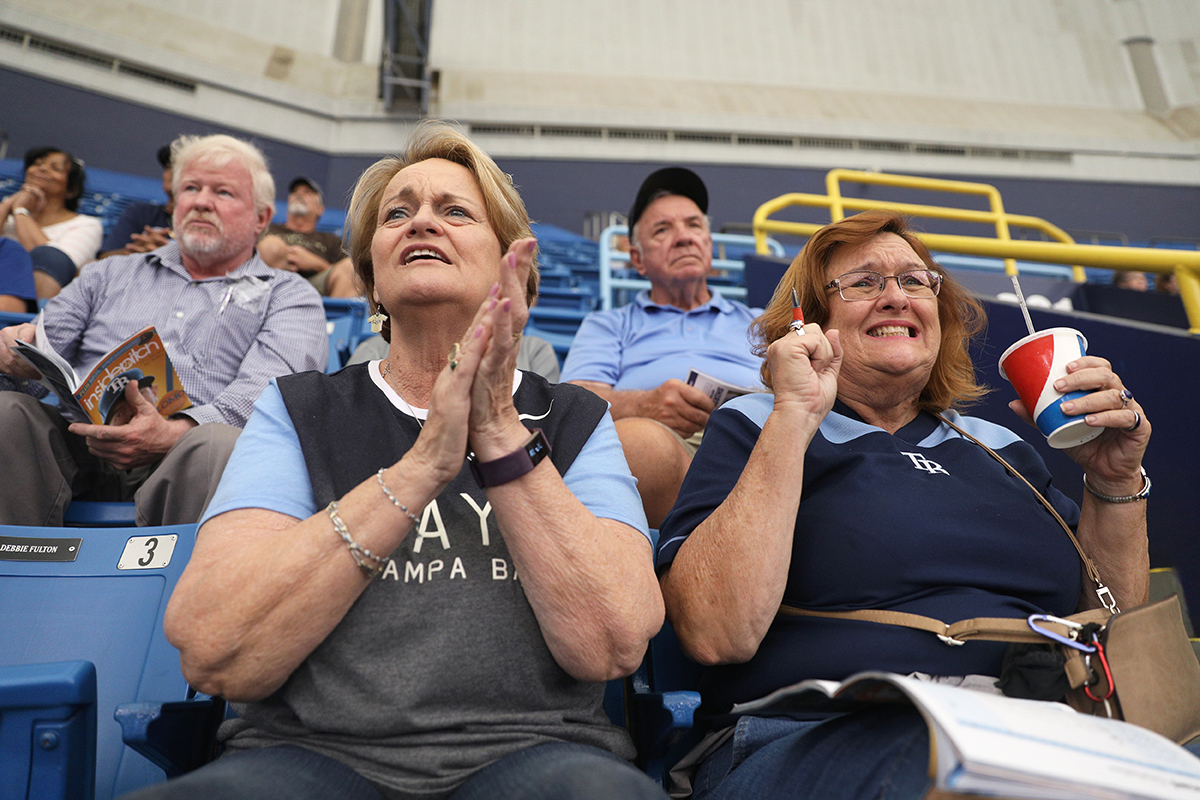 Nancy Tokarz and Patty Griffing enjoy a Tampa Bay Rays baseball game in St. Petersburg, Florida.