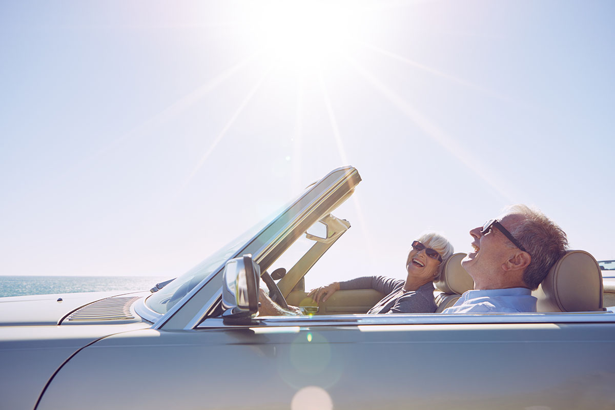 happy couple off on a road trip together