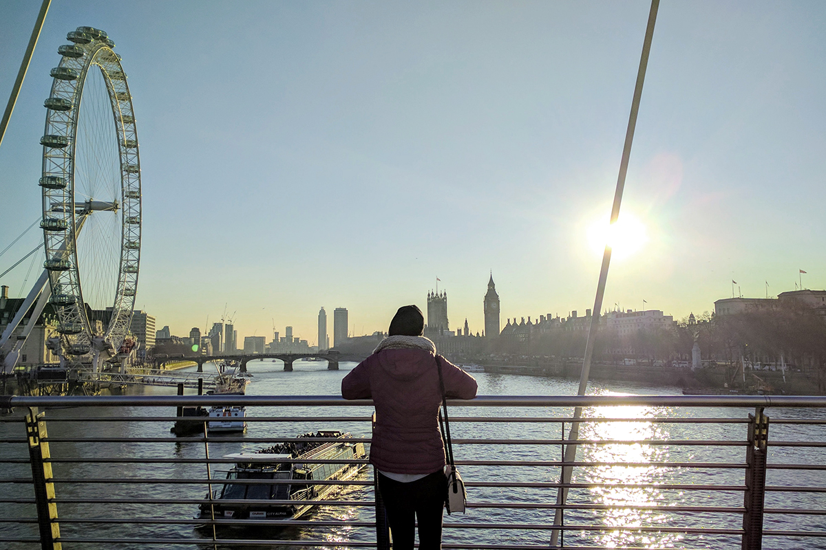 a woman looking out over a scenic view
