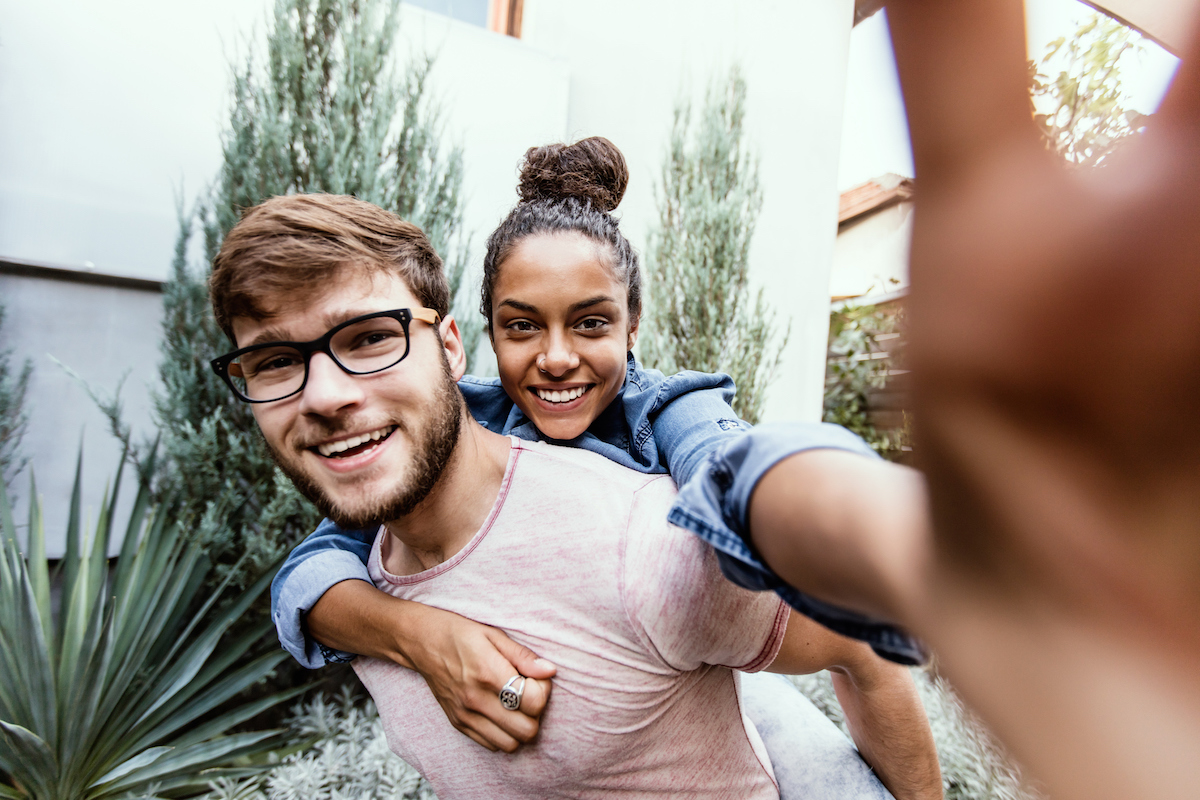 Boy and girl taking selfie