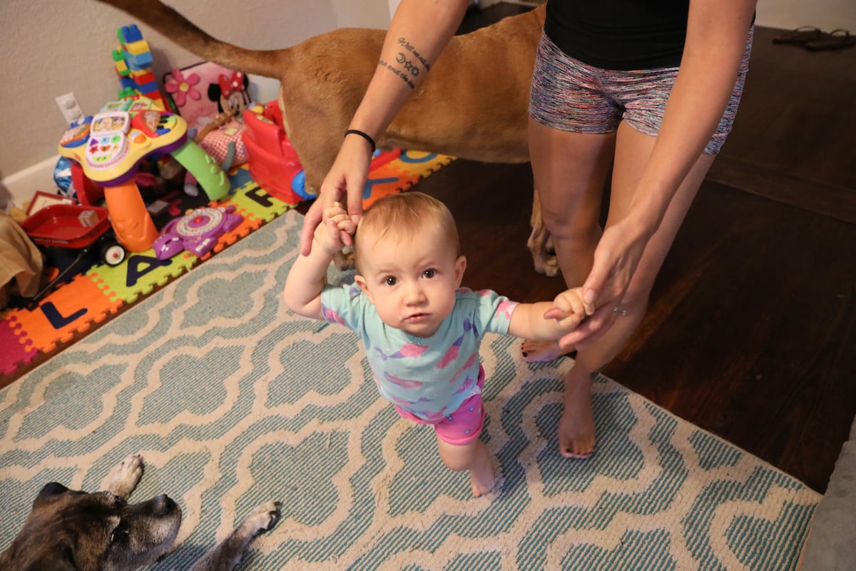 Denielle Kennet plays with her daughter, Lennon Kennet, in their St. Petersburg, Fla., home.