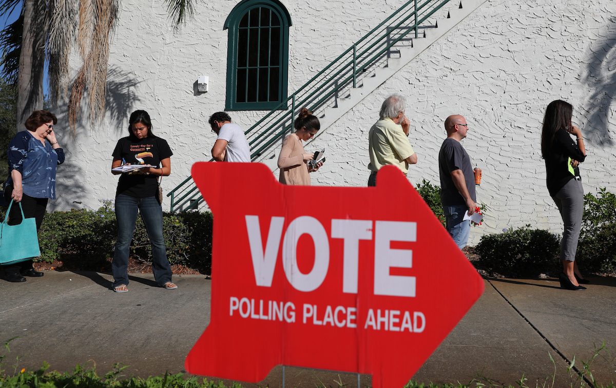 People wait to vote at the the Coliseum in St. Petersburg, Fla., on Tuesday Nov. 8, 2016.