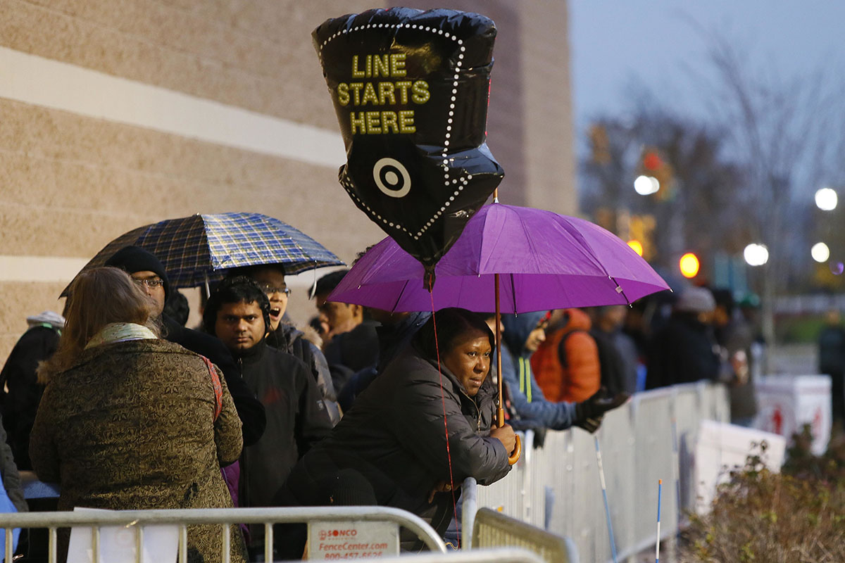 Guests wait for Black Friday sales before Target doors in Jersey City open on Nov. 24, 2016.