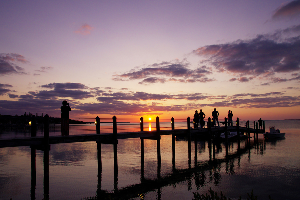 People watch the sunset in The Florida Keys.