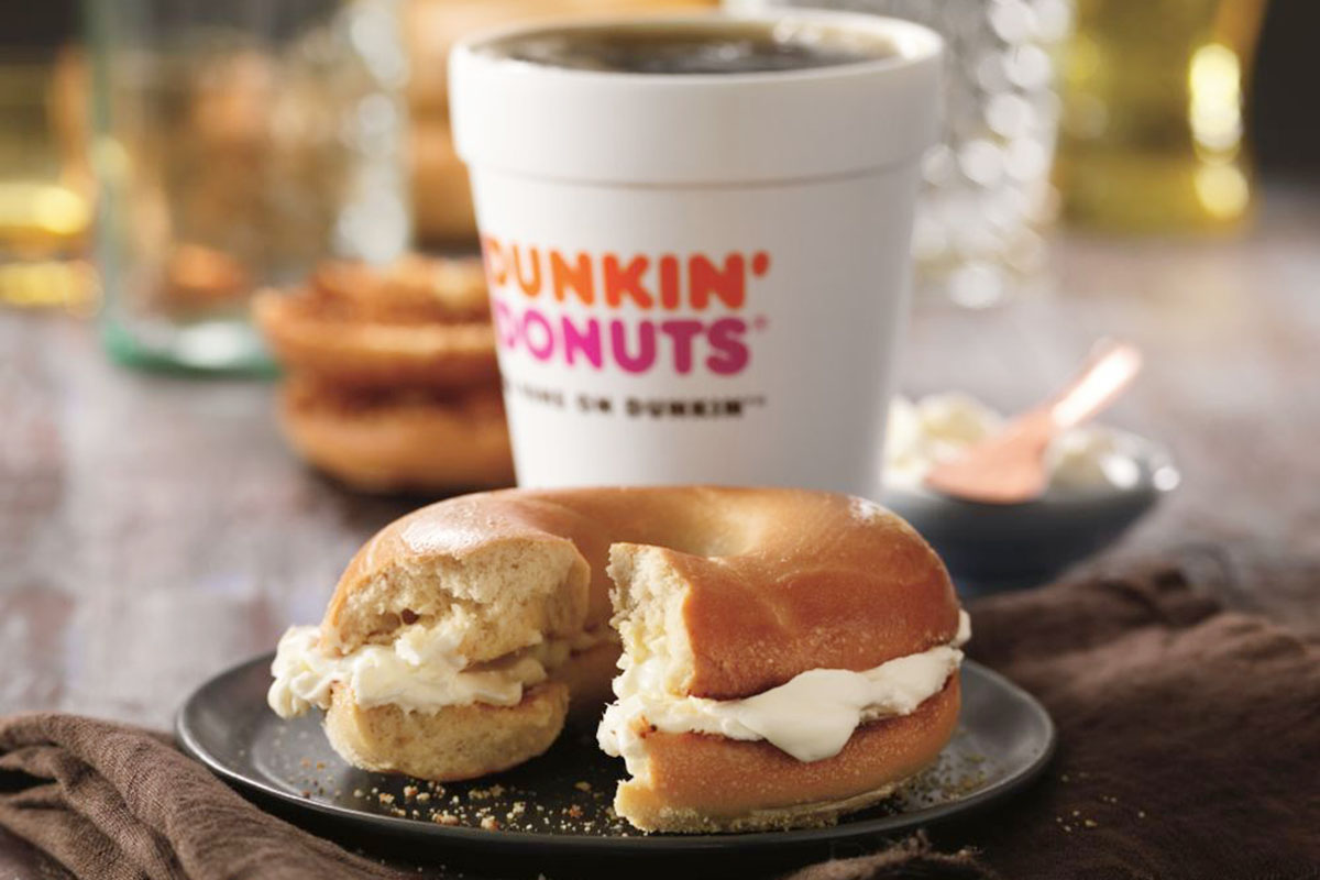 dunkin' donuts coffee and bagel on table