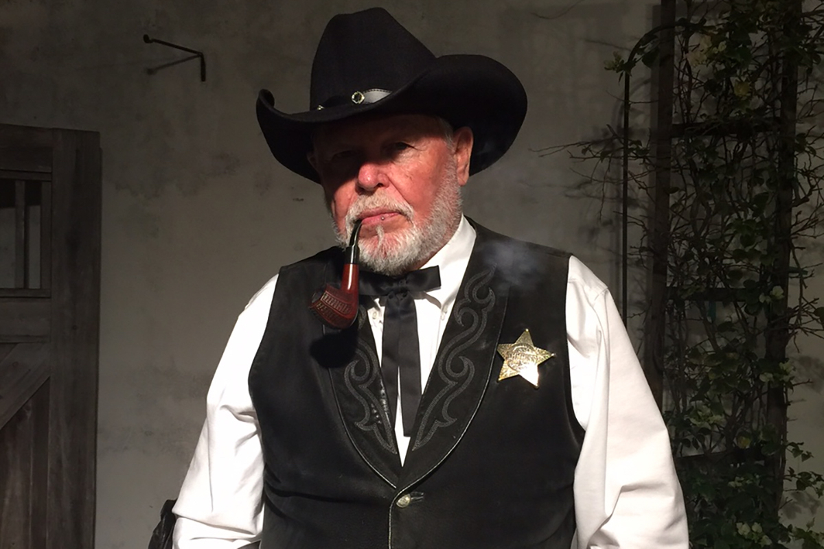 Doug Stenroos in a sheriff outfit