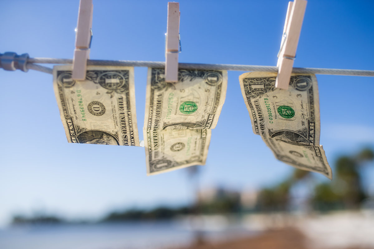 dollar bills hanging on line