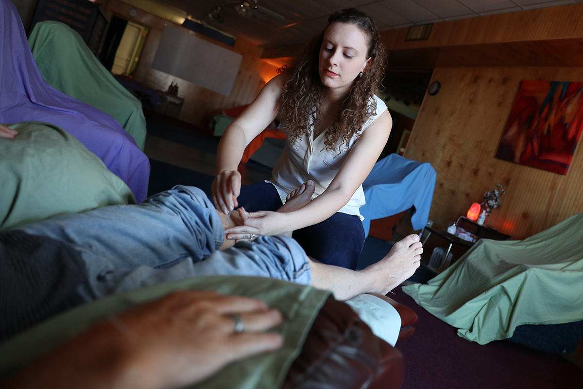 Jen Smith treats Gerard Waters at St. Pete Community Acupuncture in St. Petersburg, Fla.