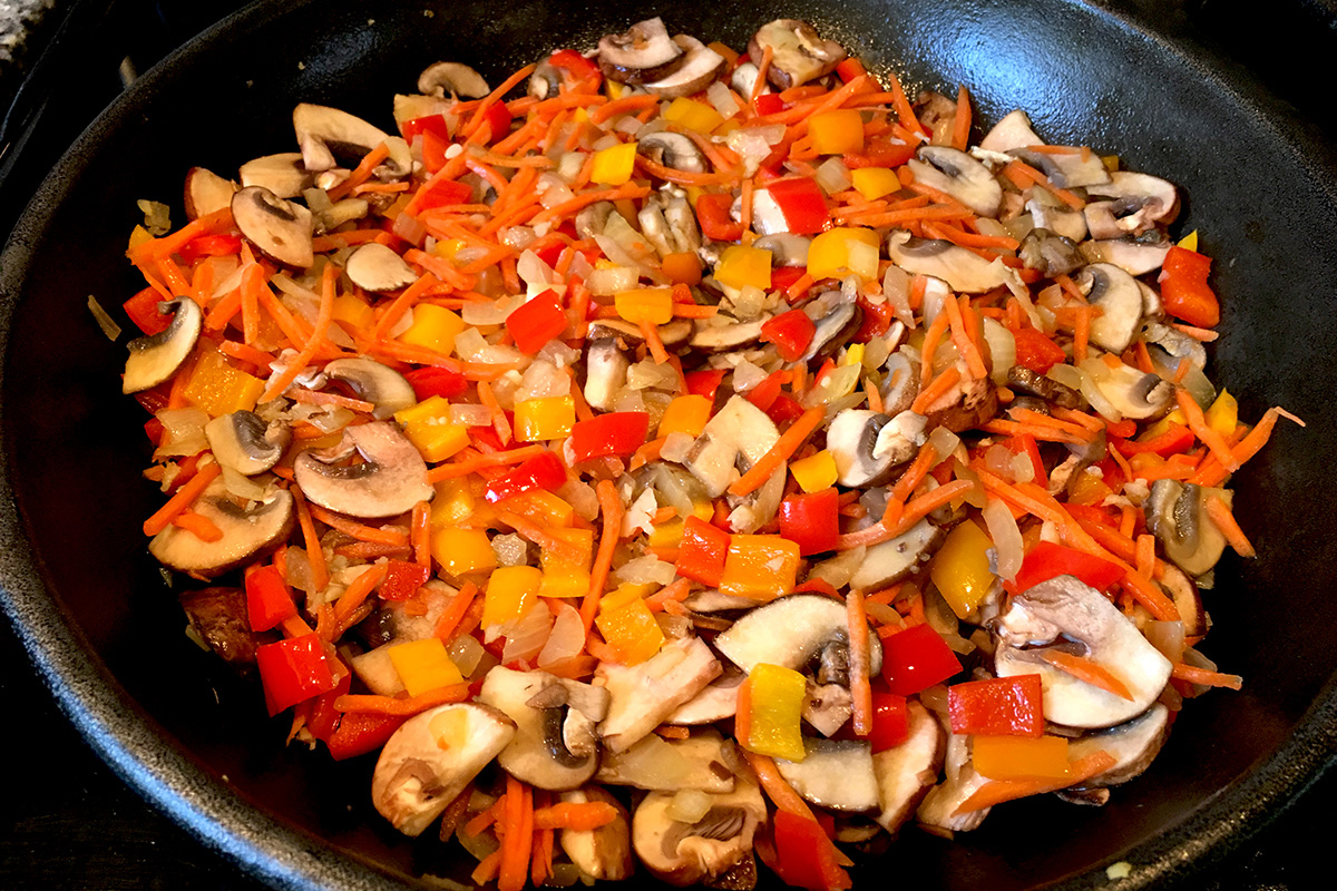 vegetables cooking in a pan