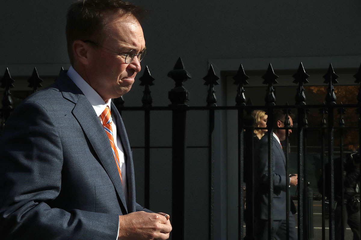Mick Mulvaney leaves the Consumer Financial Protection Bureau in Washington