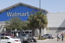 People shop at Walmart in St. Petersburg Fla on Oct. 11, 2017.