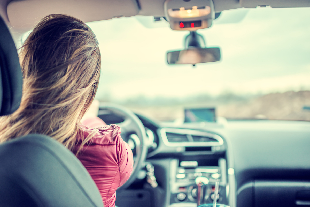 Woman driving car