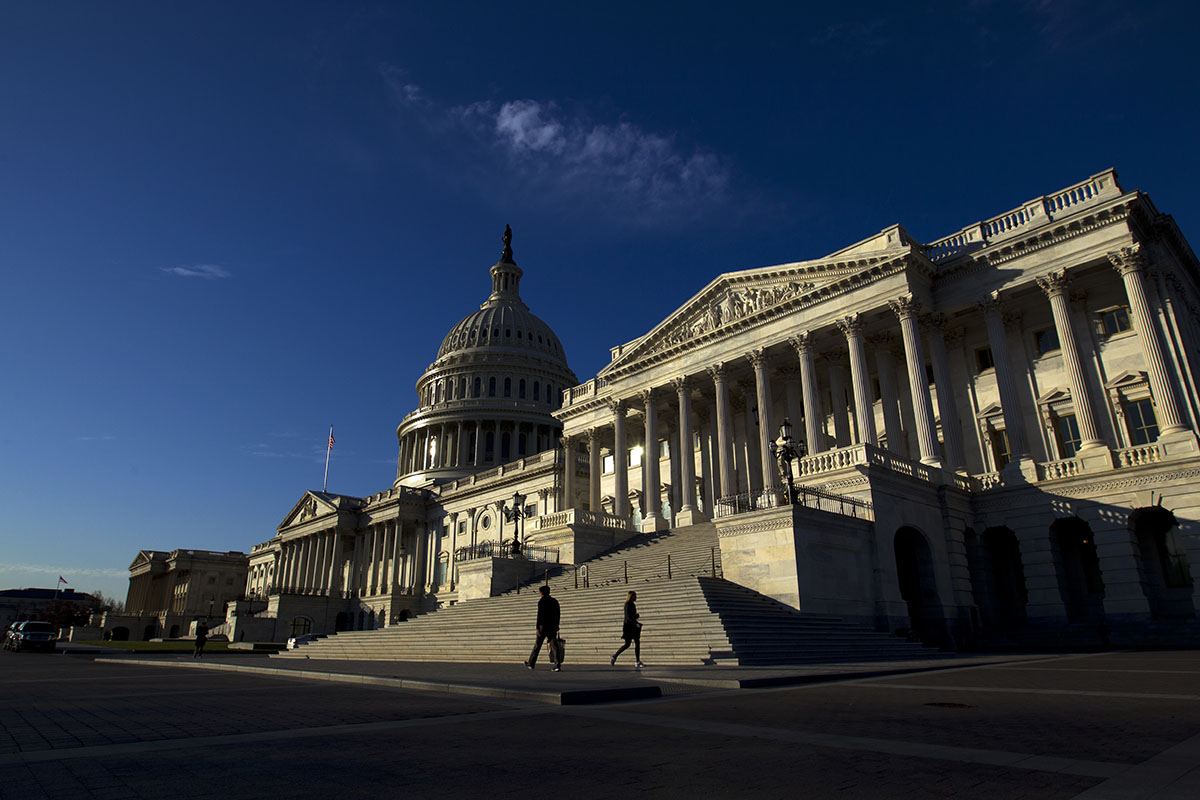 People walk outside the Capitol