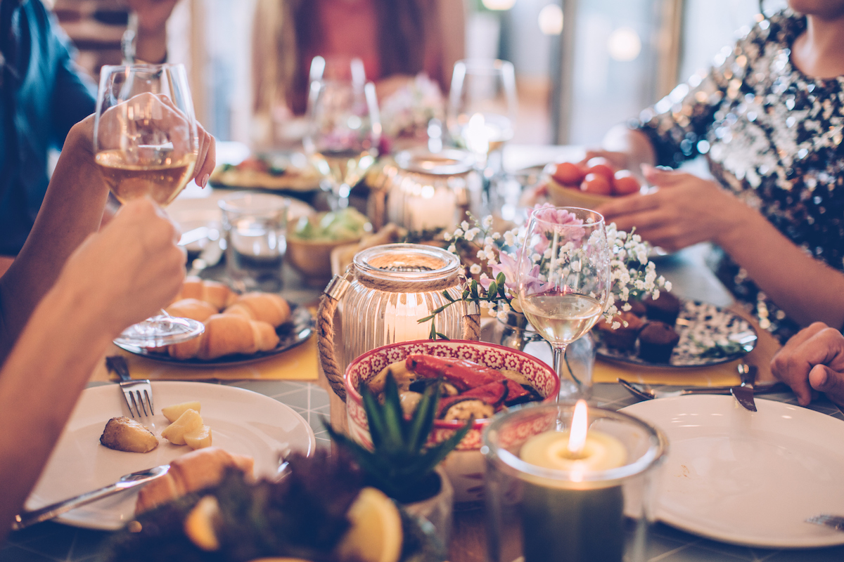Friends having dinner party at home