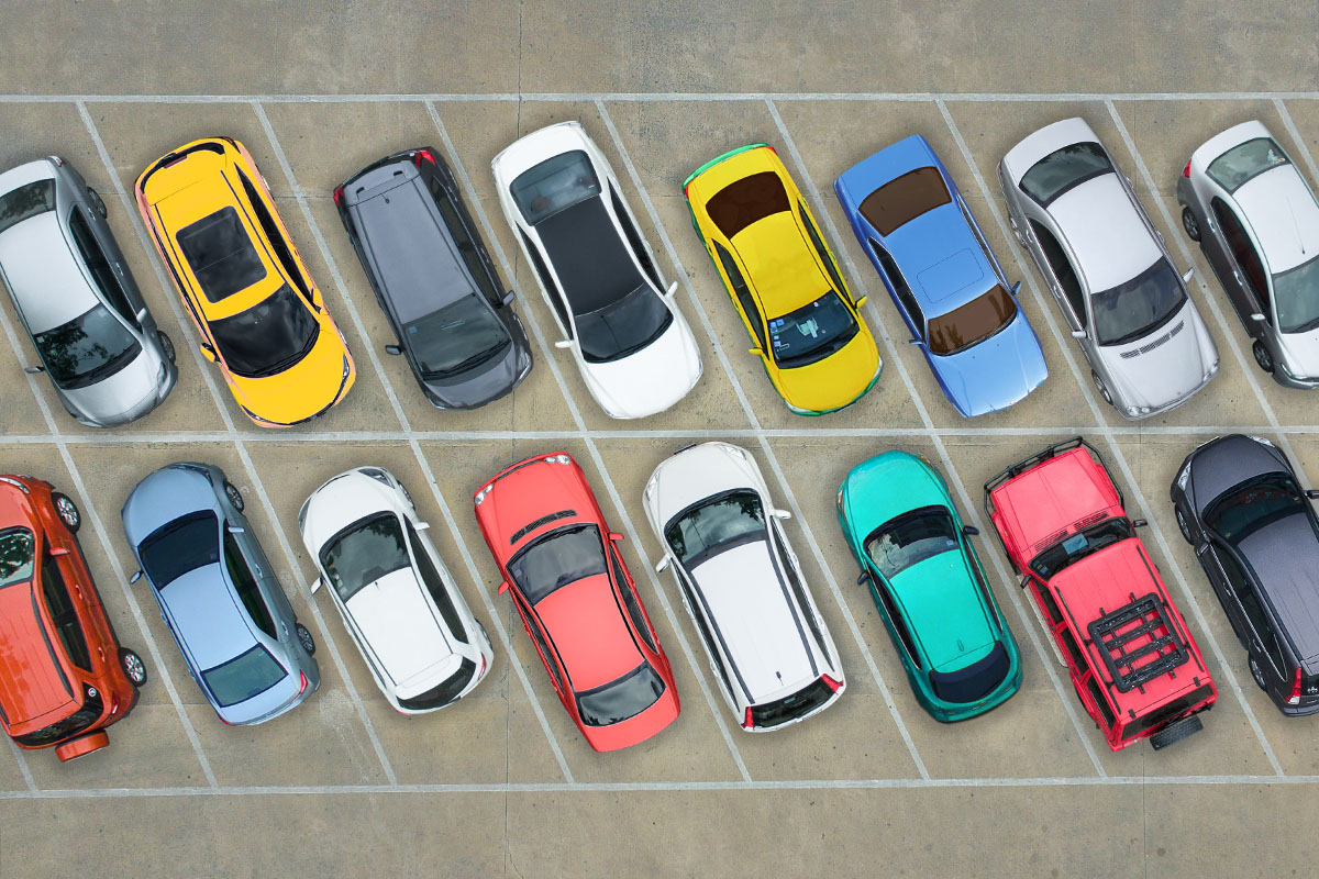 cars parked in a parking lot aerial view