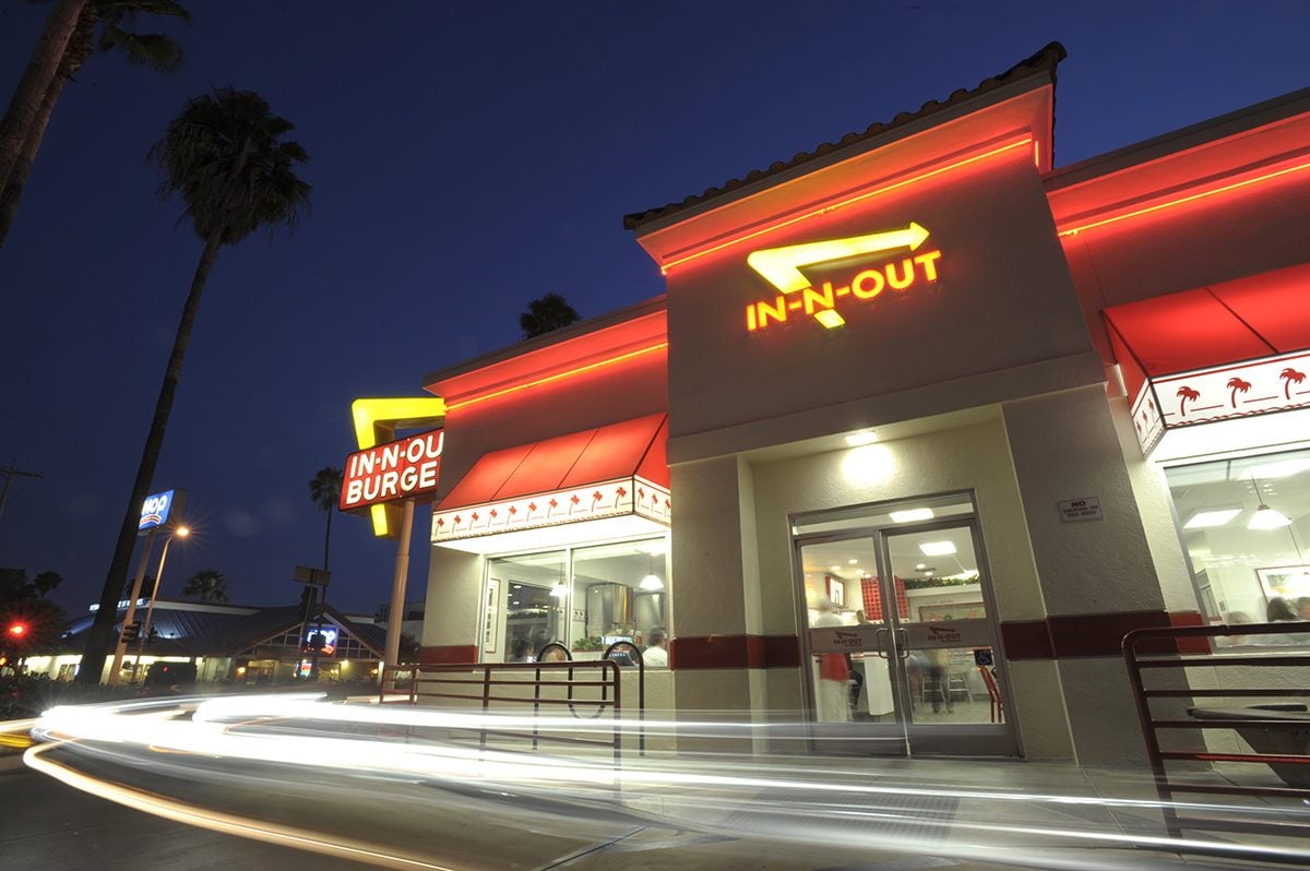 Slow motion blur of cars driving around an In-N-Out Burger on Friday, June 11, 2010, in the Hollywood area of Los Angeles.