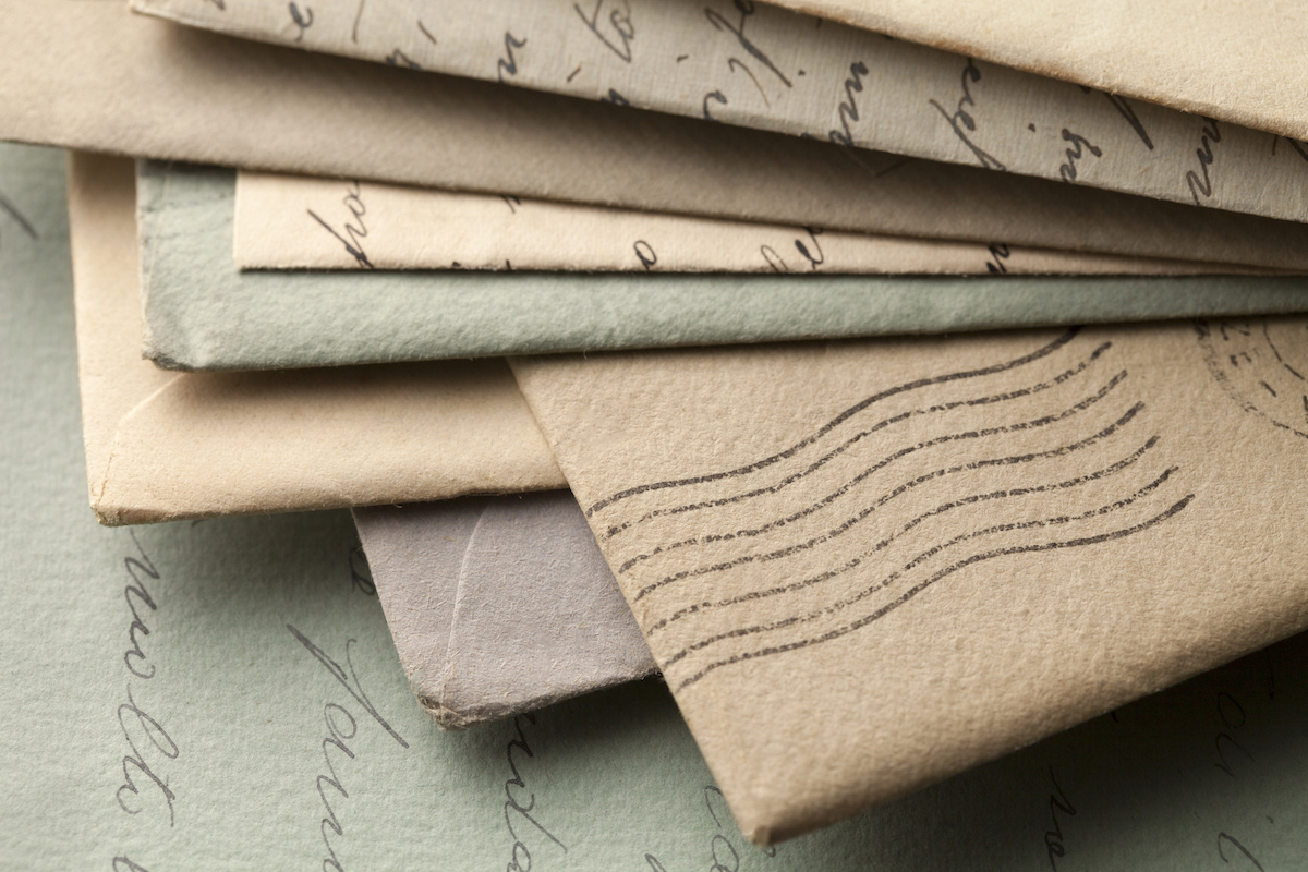 Pile of old letters with envelopes.