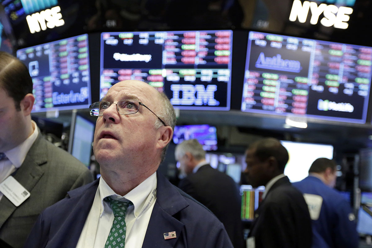 Trader Frederick Reimer works on the floor of the New York Stock Exchange, Tuesday, Feb. 6, 2018