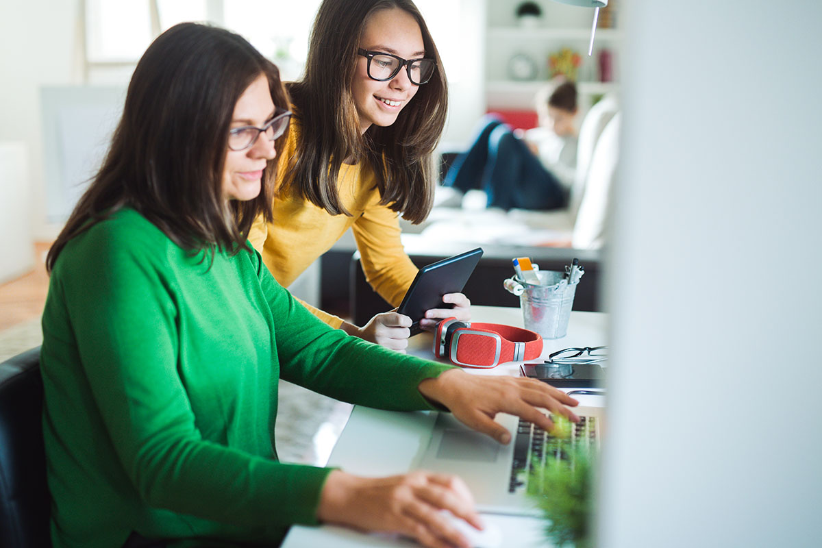 mother working from home with daughter