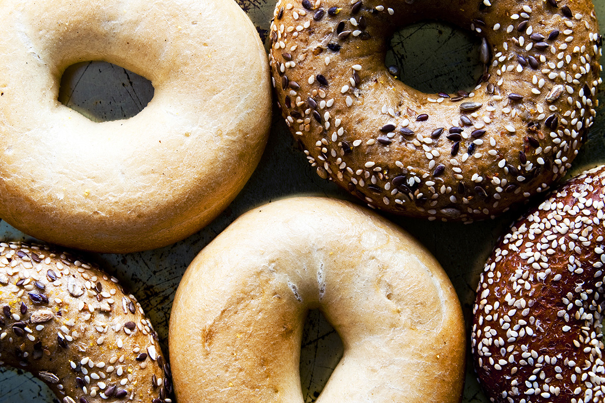 Close up shot of different types of bagels.