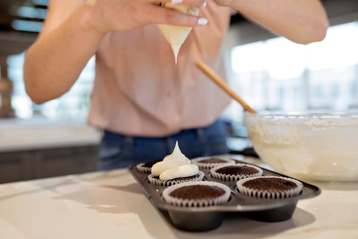 Grace Schweizer prepares Chocolate Stout Cupcakes with Irish Cream Frosting.