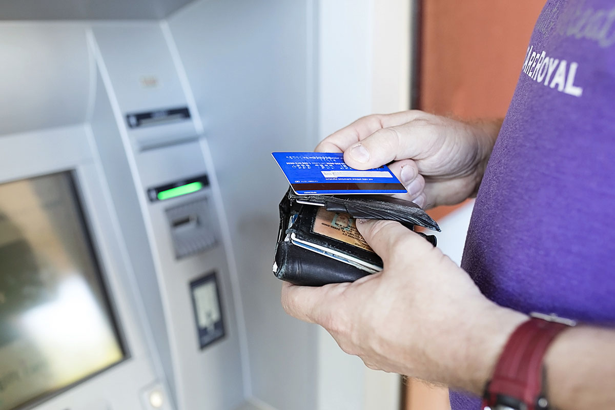 Jerry Morgan uses an ATM in St. Petersburg, Fla.