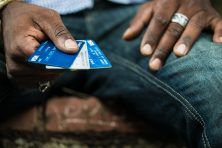 Man holding credit cards
