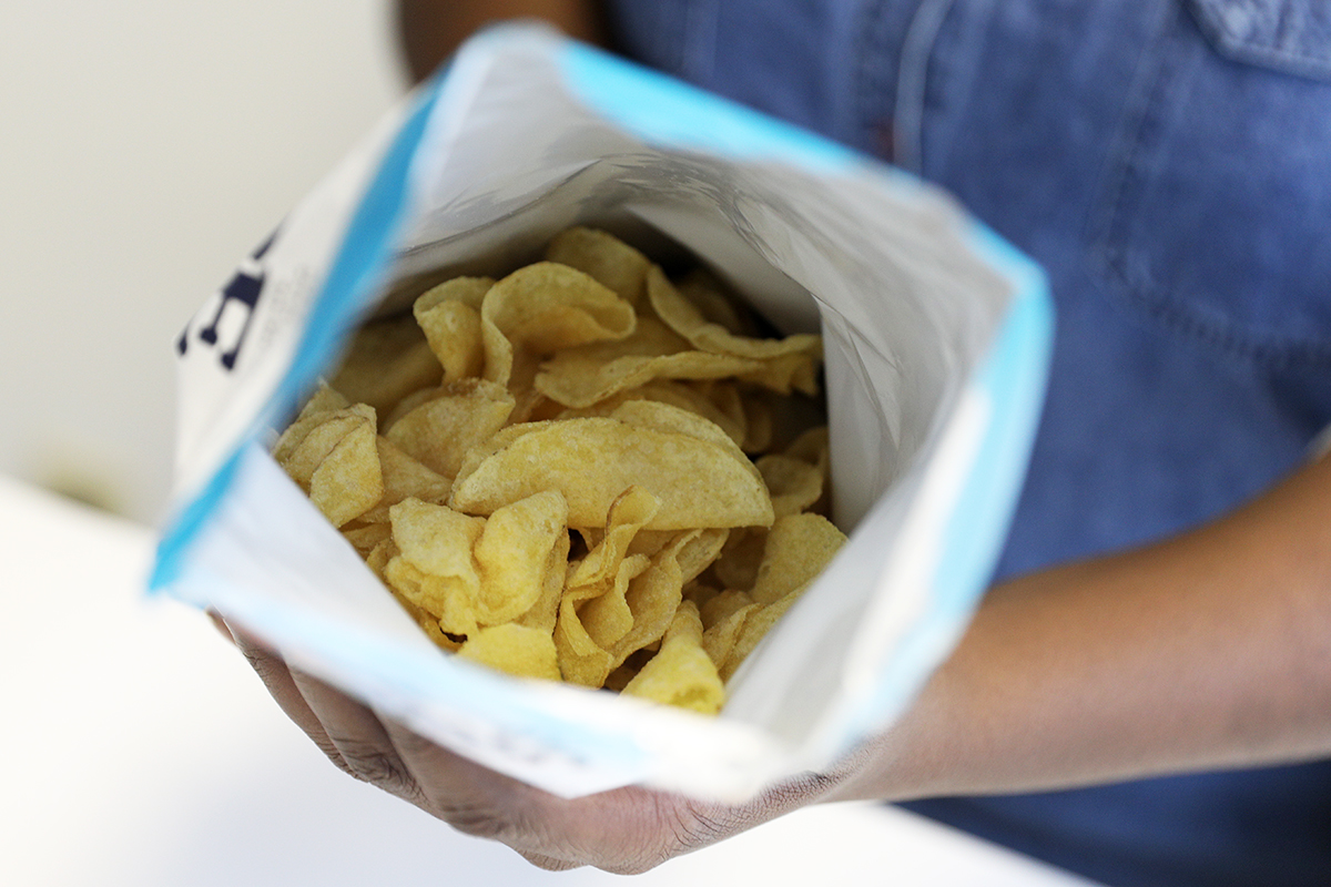 A bag of chips are open