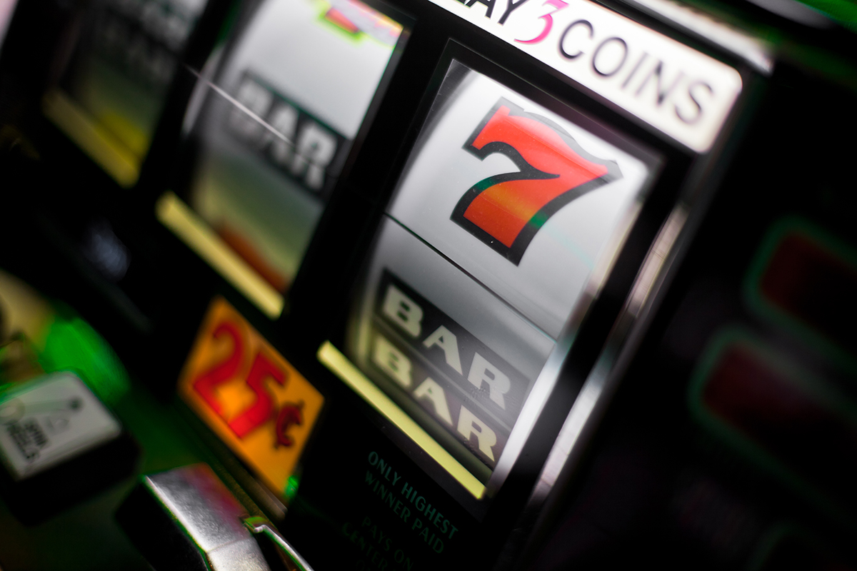 Shallow focus shot of slot machines at a casino.