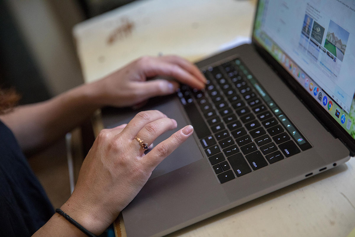 Hands at laptop