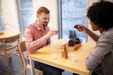 Patrick Grieve and his rented friend Lauren Little have tea in Chicago, Ill., on April 13, 2018. Carmen Mandato/ The Penny Hoarder
