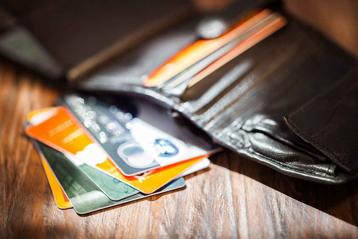 Leather wallet open revealing credit cards