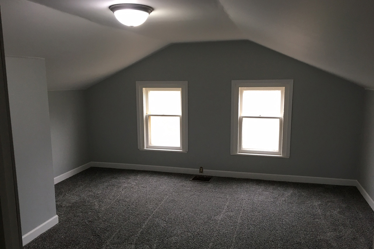 A bedroom in a house after remodeling.