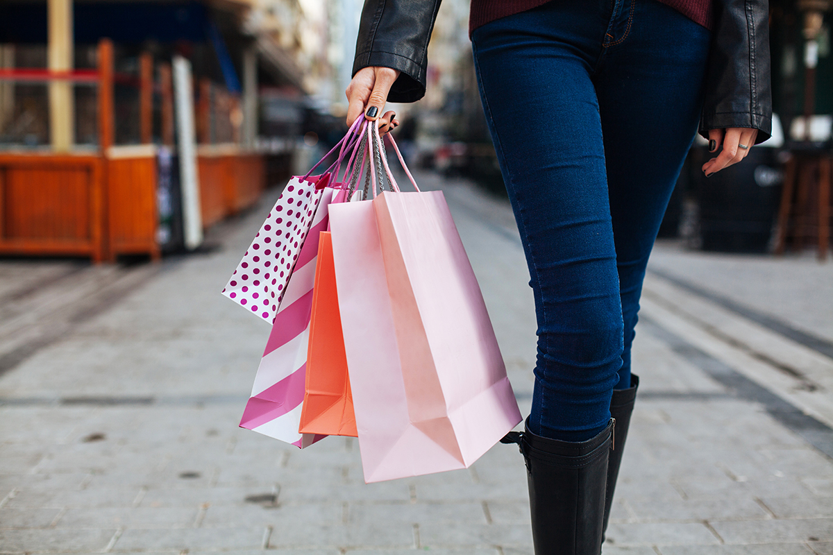 woman carrying shopping bags