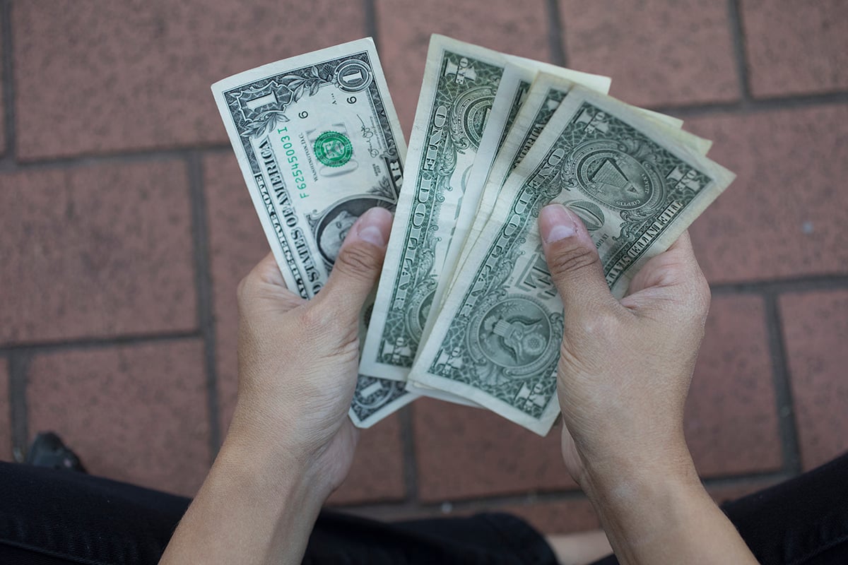 Aileen with money.