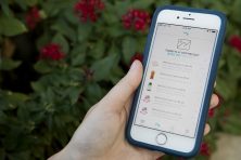 Kathleen Garvin, outreach strategist and editor at TPH, checks out Paribus on her phone. By using Paribus, she's received about in refunds.