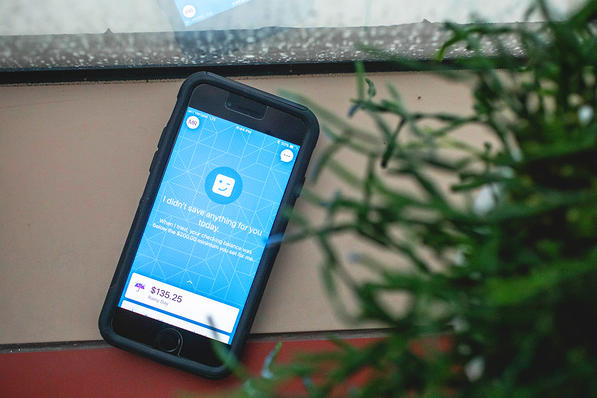 A cell phone displays the Digit app
