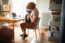 Woman working at home doing home finances.